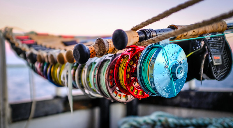 Several fly rods on a rope rack