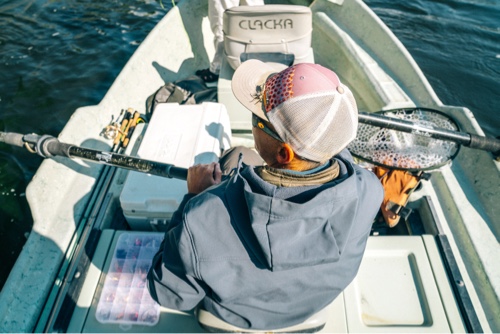 Fishing guide in a drift boat on the water